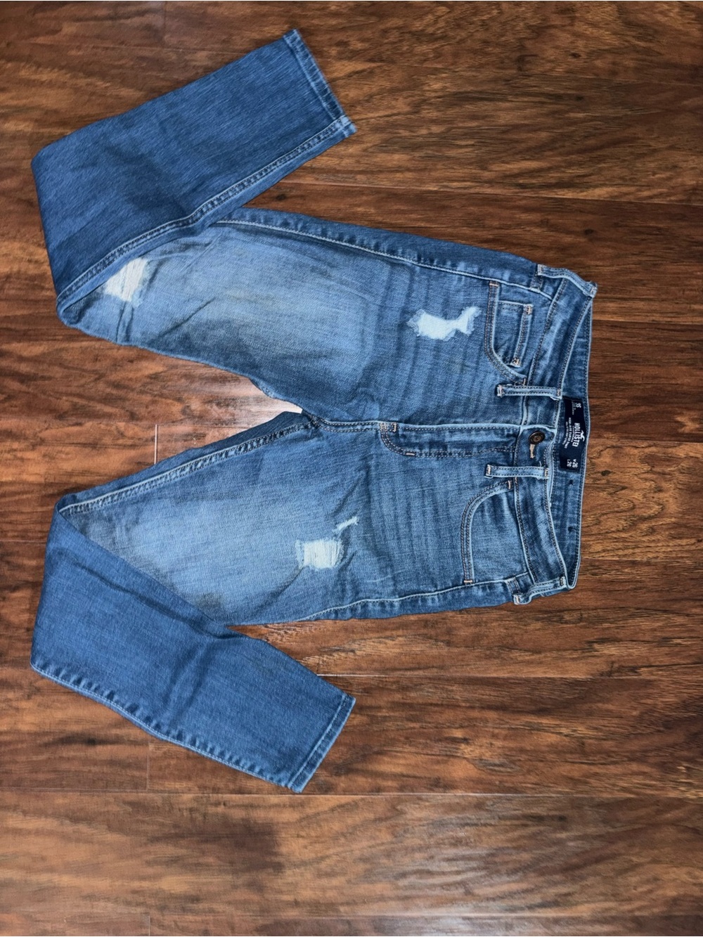Hollister Women's Skinny Jeans in Medium Blue with Distressed Accents